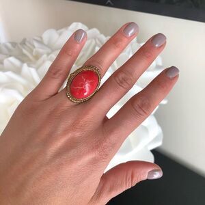 Red oval stone ring
